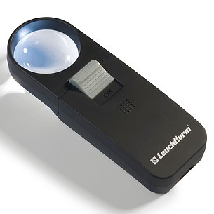 Hand held 7x magnifier with LED